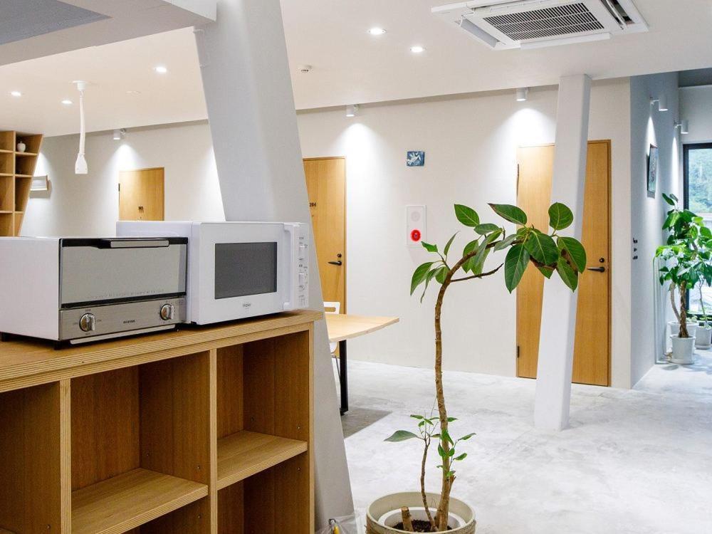Denpaku Akakina Hotel Amami Buitenkant foto