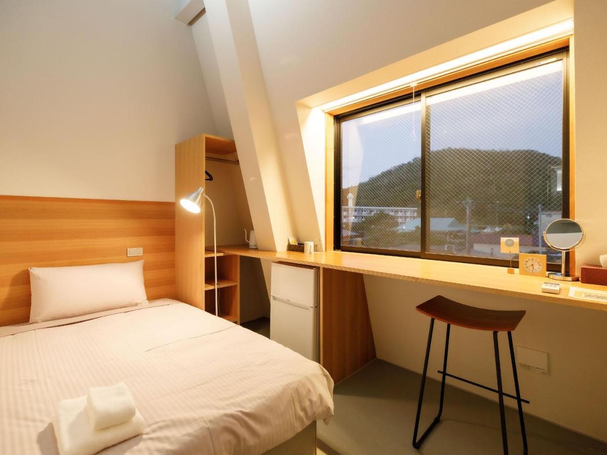 Denpaku Akakina Hotel Amami Kamer foto